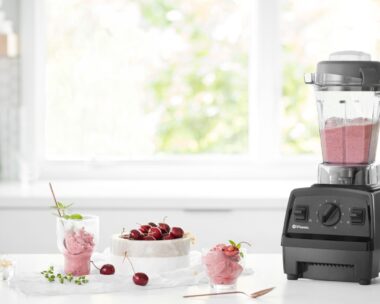 Vitamix Experian blender with a pink fruity smoothie